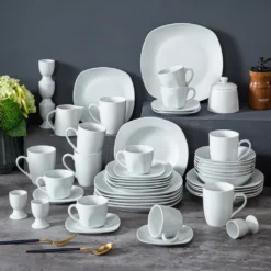 MALACASA, Serie Elisa, 50-teilig Tafelservice Aus Porzellan Für 6 Personen, Kombiservice Frühstückservice Kaffeeservice Mit Eierbecher, Kaffeetassen, Untertassen, Müslischalen, Dessertteller -Küchenbedarf Geschäft 0fff2d372201425aa018fdc19d09c4b6